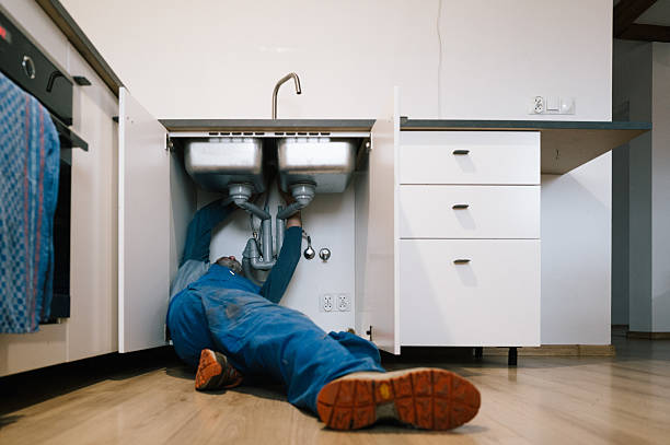 Professional Plumbing technician working in Gwynn Oak, MD